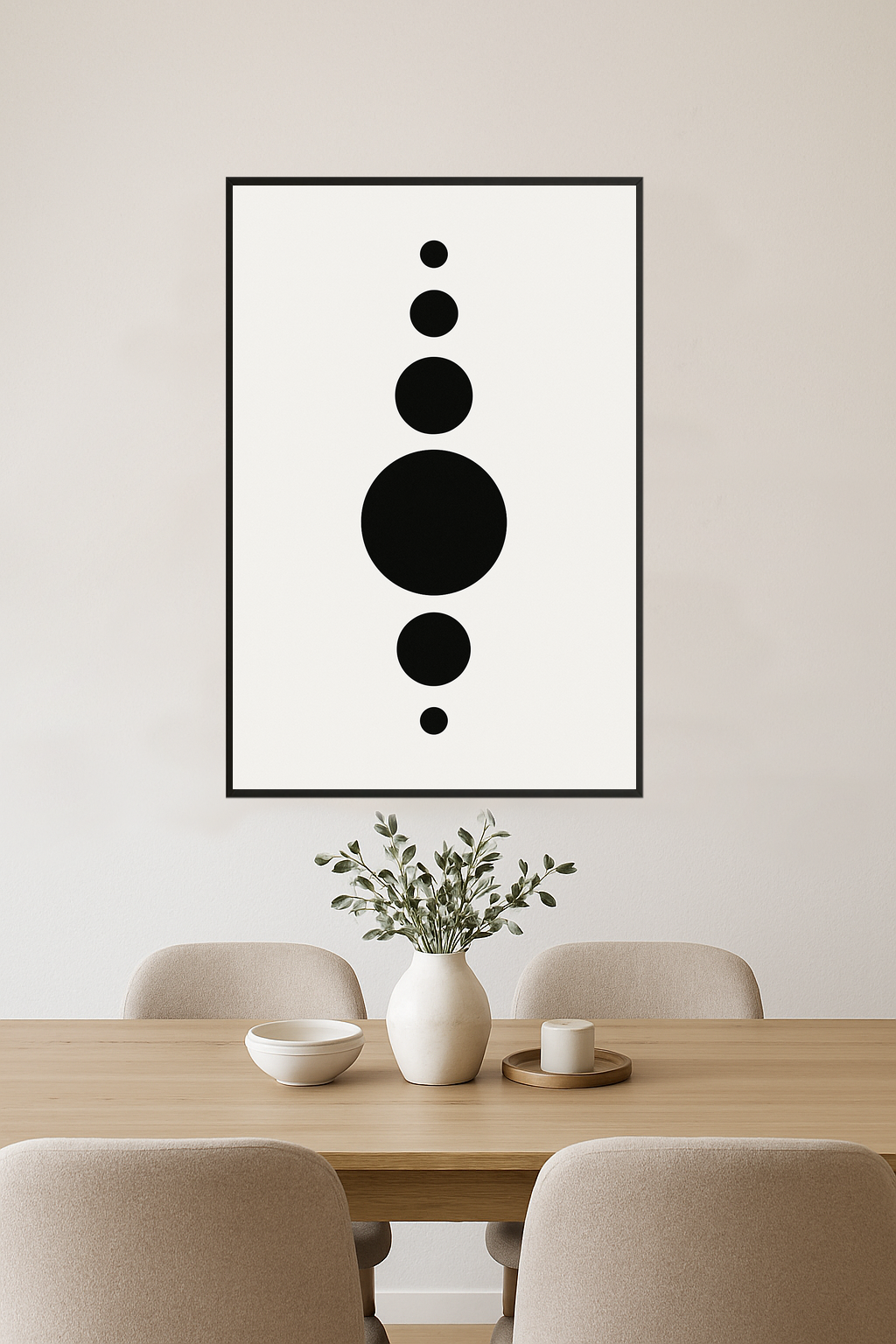 Five black circles of varying sizes on a white background.- jadalnia