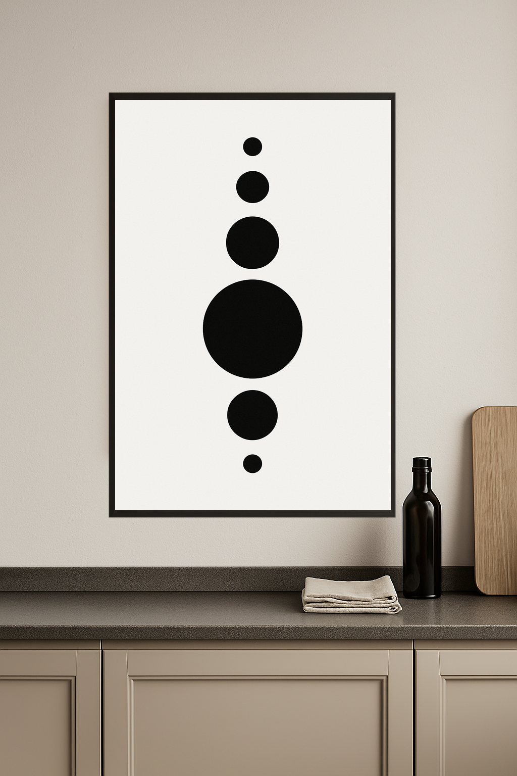 Five black circles of varying sizes on a white background.- kuchnia
