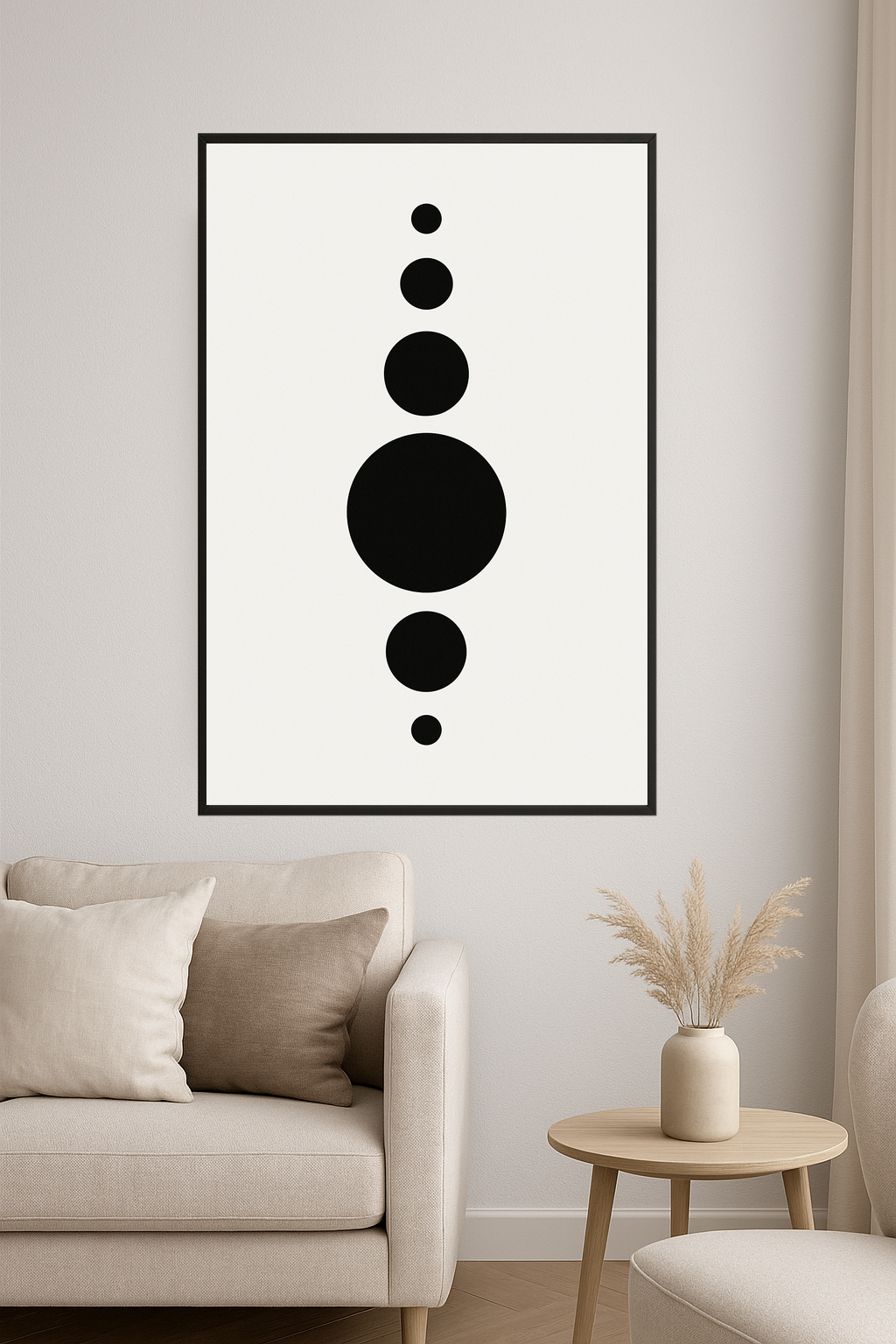 Five black circles of varying sizes on a white background.- salon