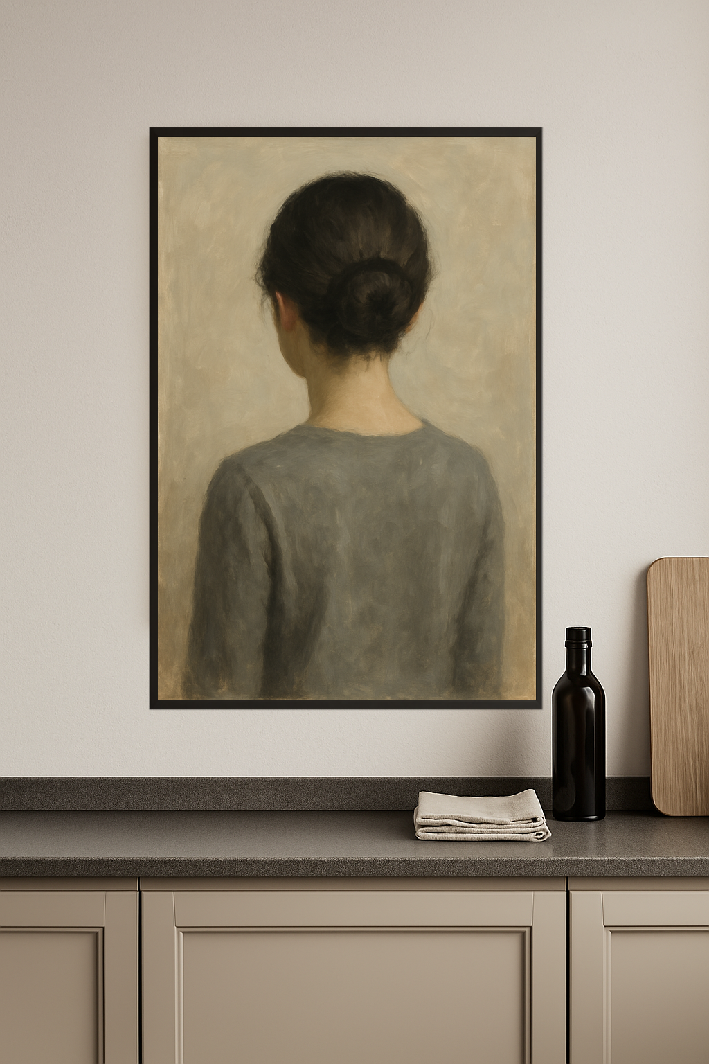 Back view of a woman with a bun wearing a gray top.- kuchnia