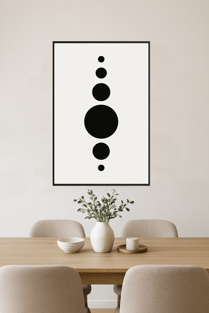 Five black circles of varying sizes on a white background.- jadalnia
