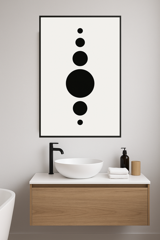 Five black circles of varying sizes on a white background.- lazienka