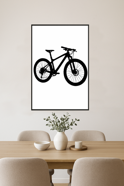 Silhouette of a mountain bike with circular wheel and angular frame.- jadalnia