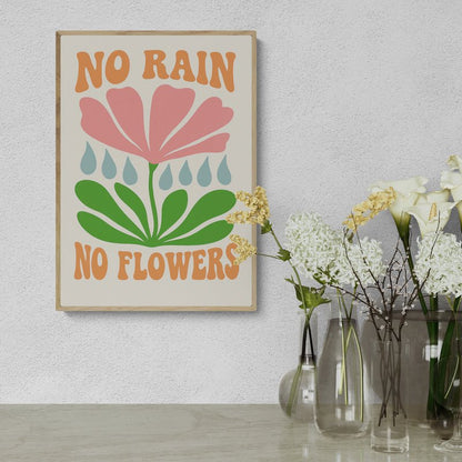 Plakat z napisem "No Rain No Flowers" i kolorową ilustracją kwiatu z kroplami deszczu, zawieszony nad konsolą z wazonami pełnymi świeżych kwiatów