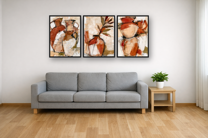 Terracotta Vessels framed poster set above a sofa in a living room