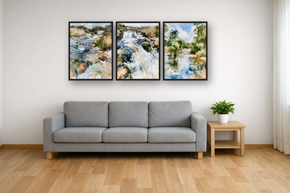 Mountain Stream framed poster set above a sofa in a living room