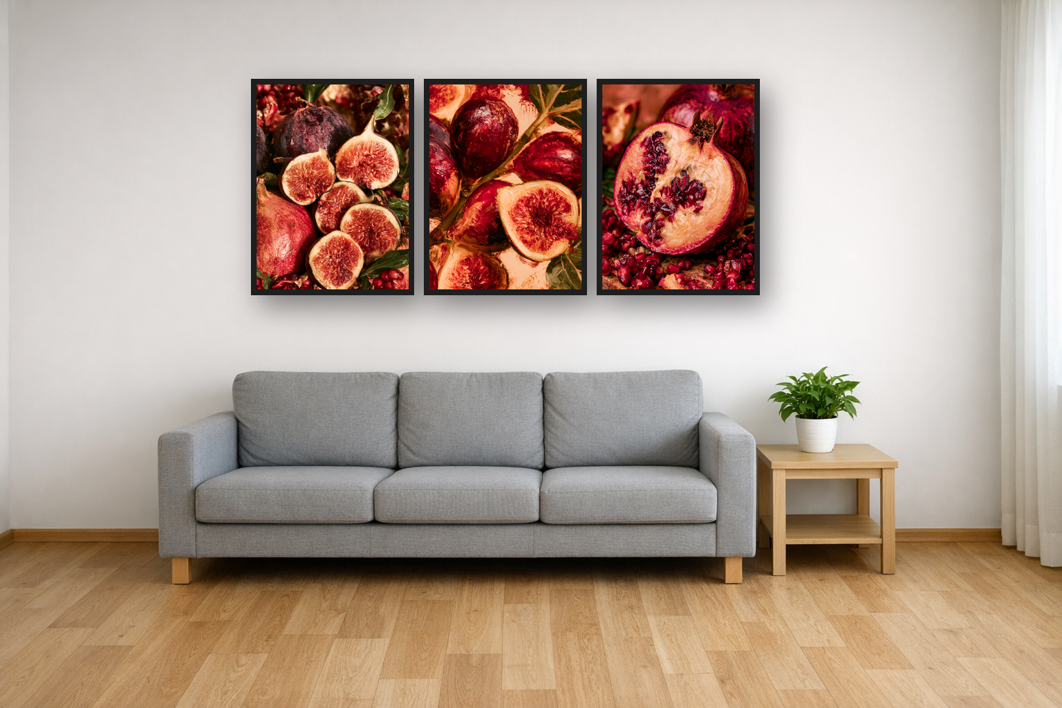 Figs and Pomegranates framed poster set above a sofa in a living room