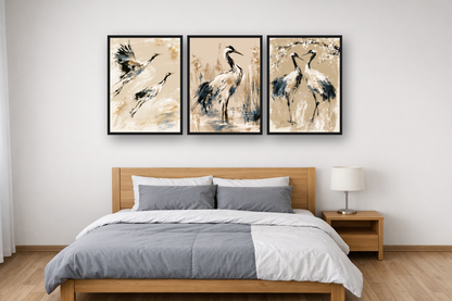 Japanese Cranes framed poster set above a bed in a bedroom