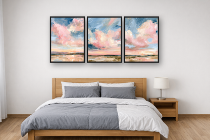 Powder Clouds framed poster set above a bed in a bedroom